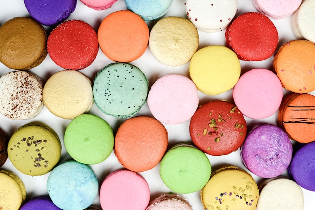 assorted colours of macaroons on a white background